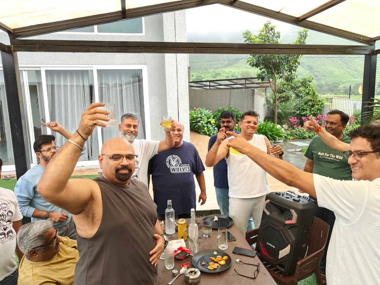 Raised glasses under the pergola